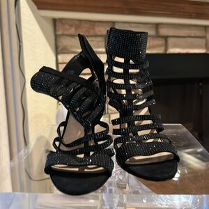 Black zip open toe heels